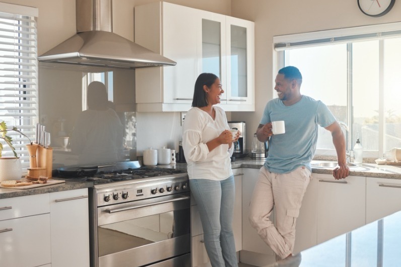 Couple in brand new kitchen